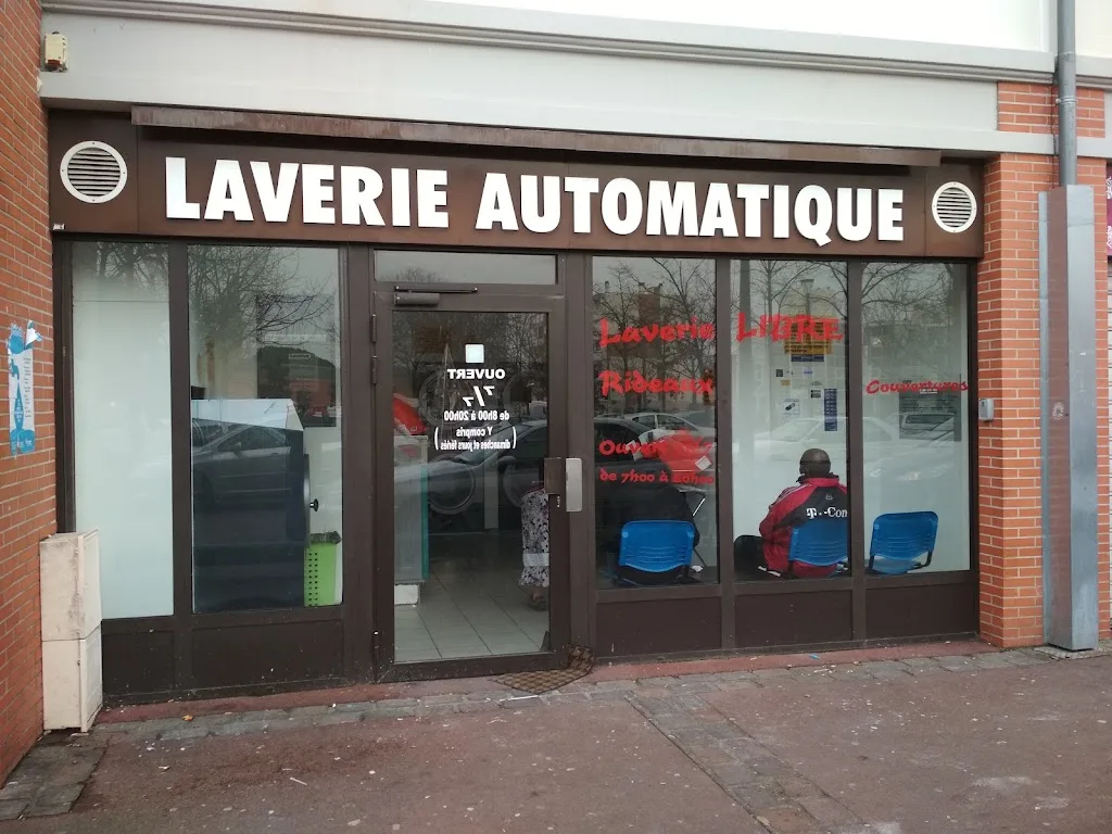 Laverie automatique - photo 1