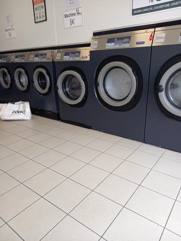 Laverie libre service - photo 1